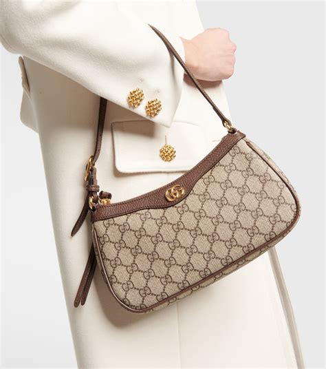 beige and white supreme gucci bag|gucci ophidia shoulder bag small.